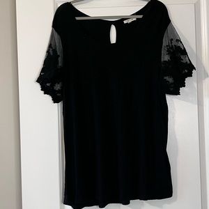 Black flowy top with lace detailed sleeves